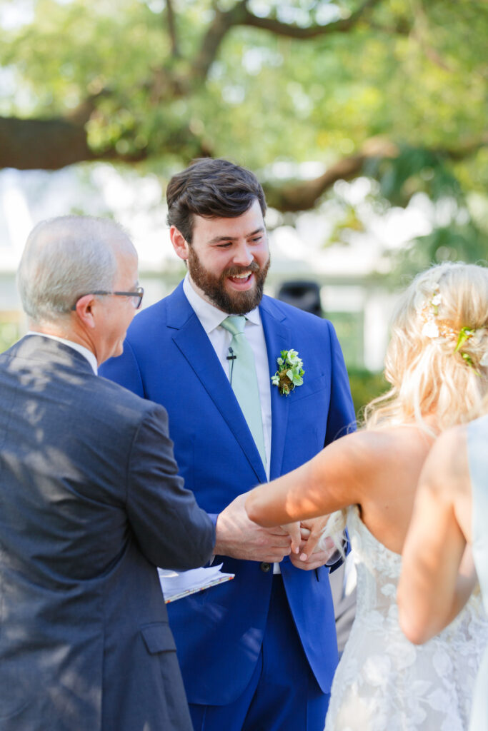 Lowndes Grove wedding groom excited during wedding ceremony