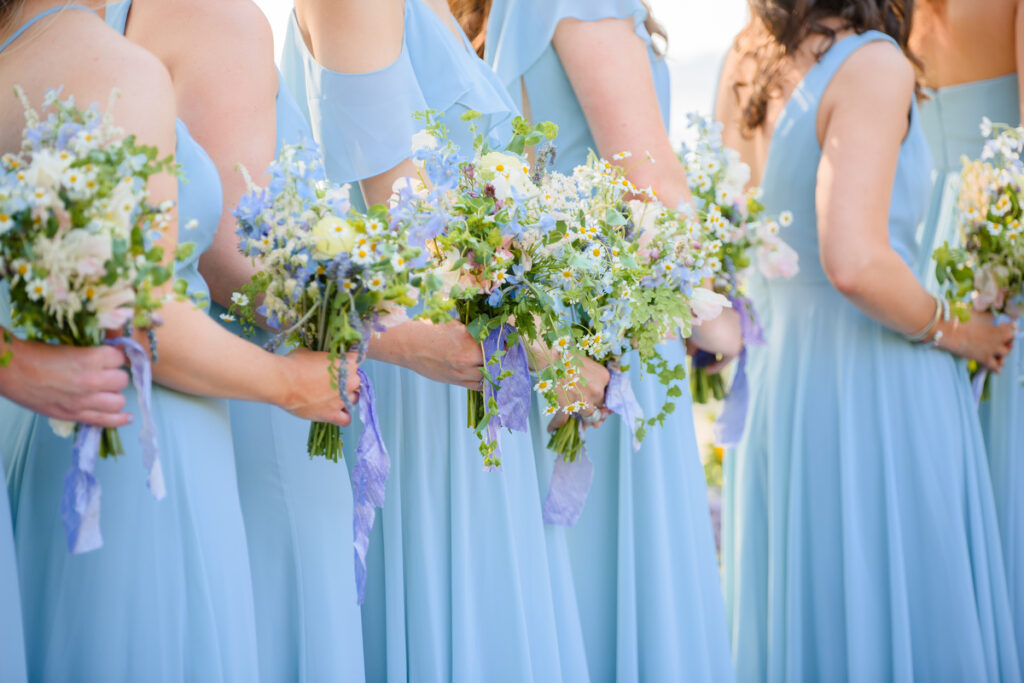 Lowndes Grove wedding bridesmaids bouquets with daisies and blue and purple flowers