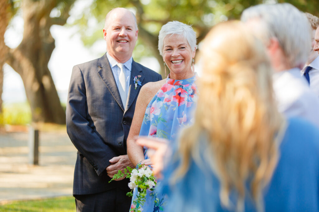 Lowndes Grove wedding groom's mother watching bride walk down the aisle