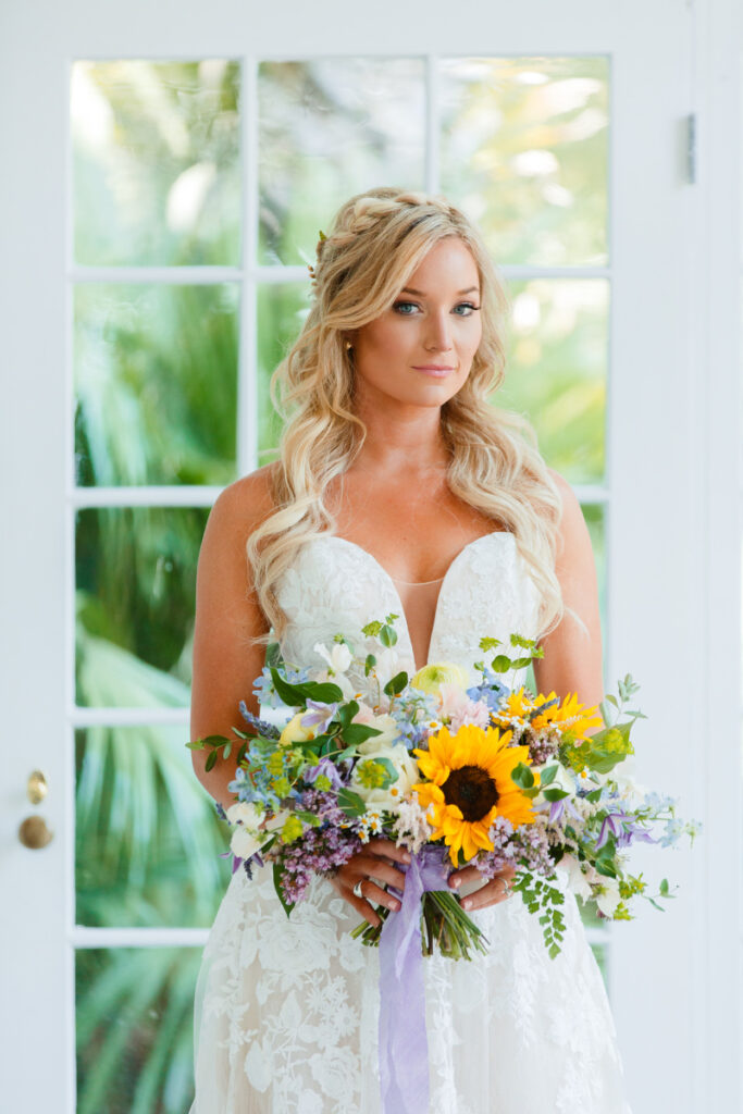 Lowndes Grove bride portrait with bouquet in atrium