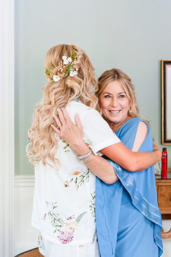 Lowndes Grove wedding bride hugging her mother