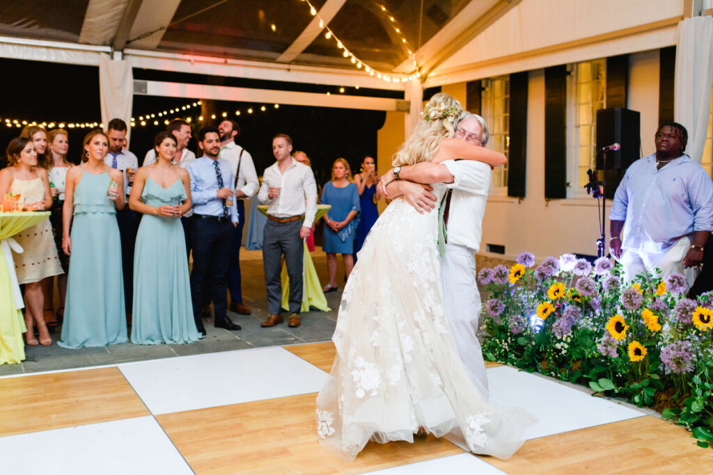 Lowndes Grove wedding father of the bride hugging bride after dance