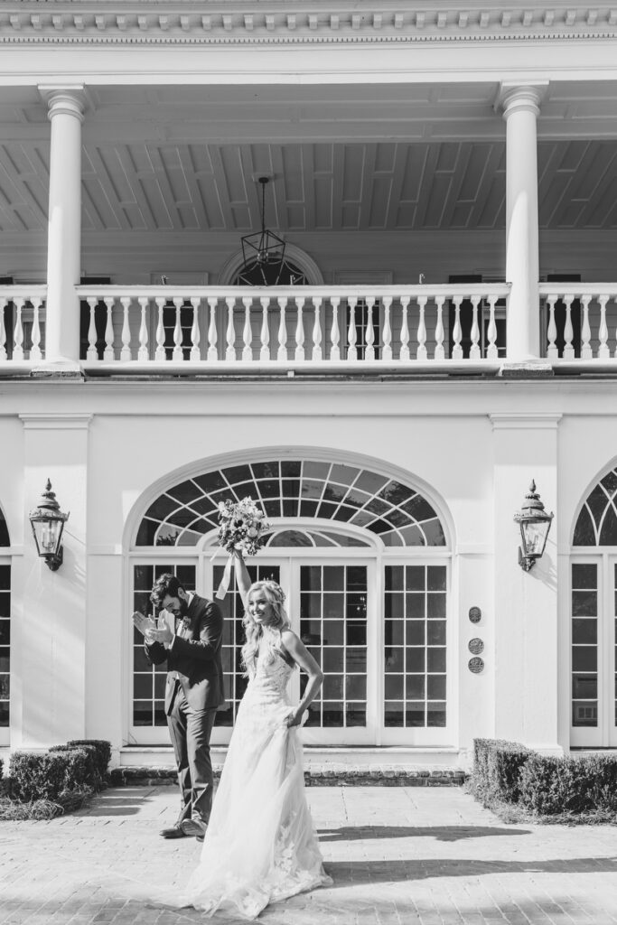 Lowndes Grove wedding bride and groom celebrating after ceremony