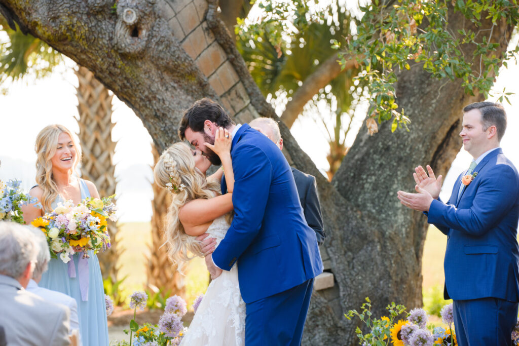 Lowndes Grove wedding ceremony kiss with bride and groom