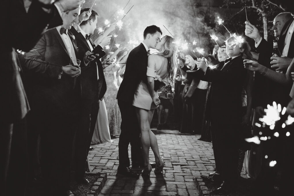 William Aiken House Wedding kiss during sparkler sendoff