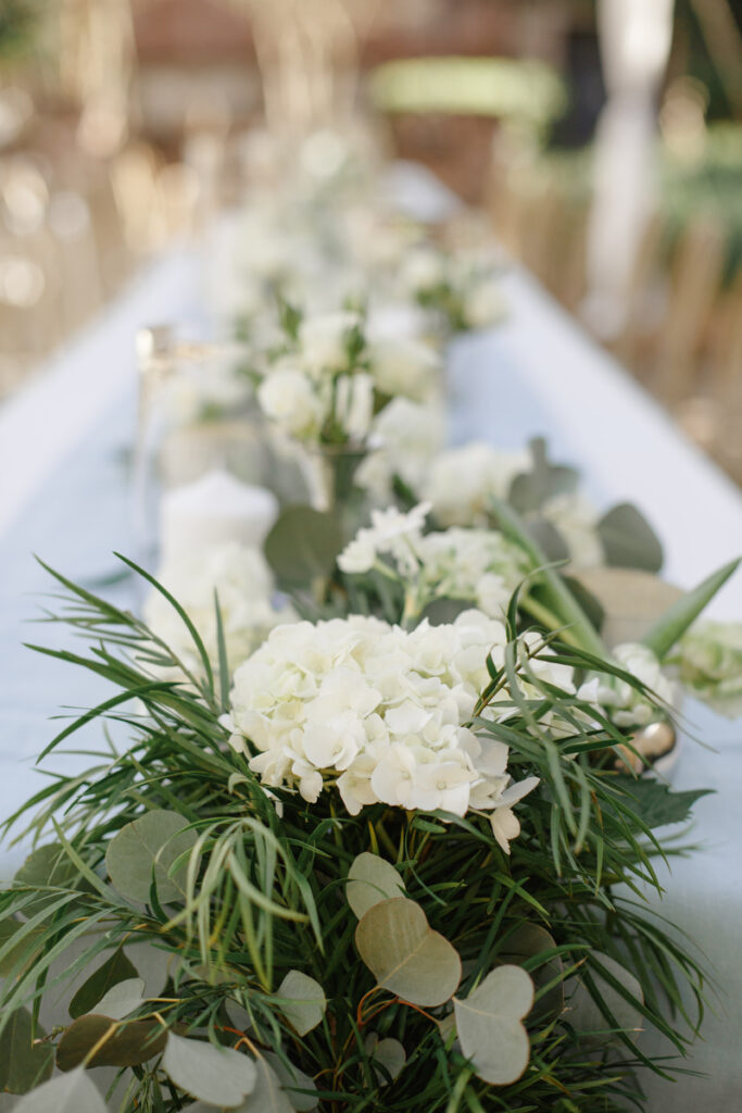 William Aiken House Wedding white flowers and greenery centerpieces