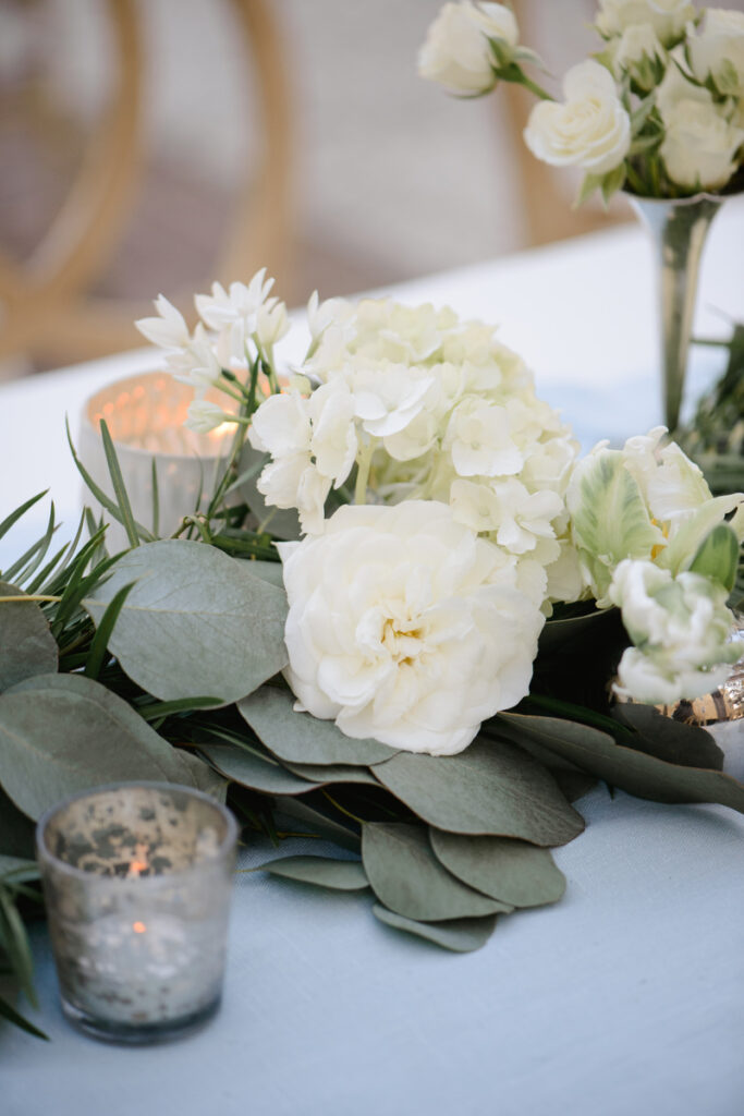 William Aiken House Wedding cascading flower centerpieces with white flowers