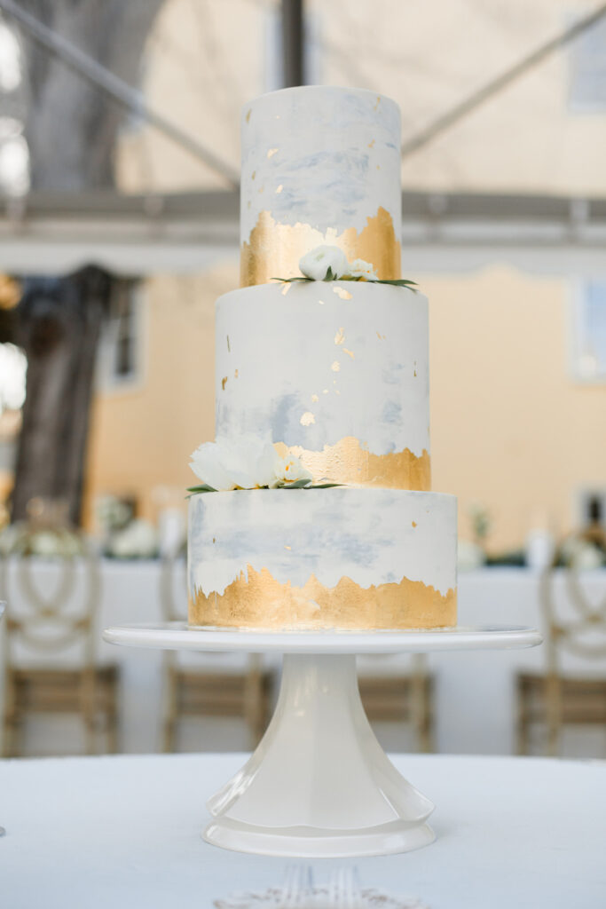 William Aiken House Wedding cake with blue and gold accents