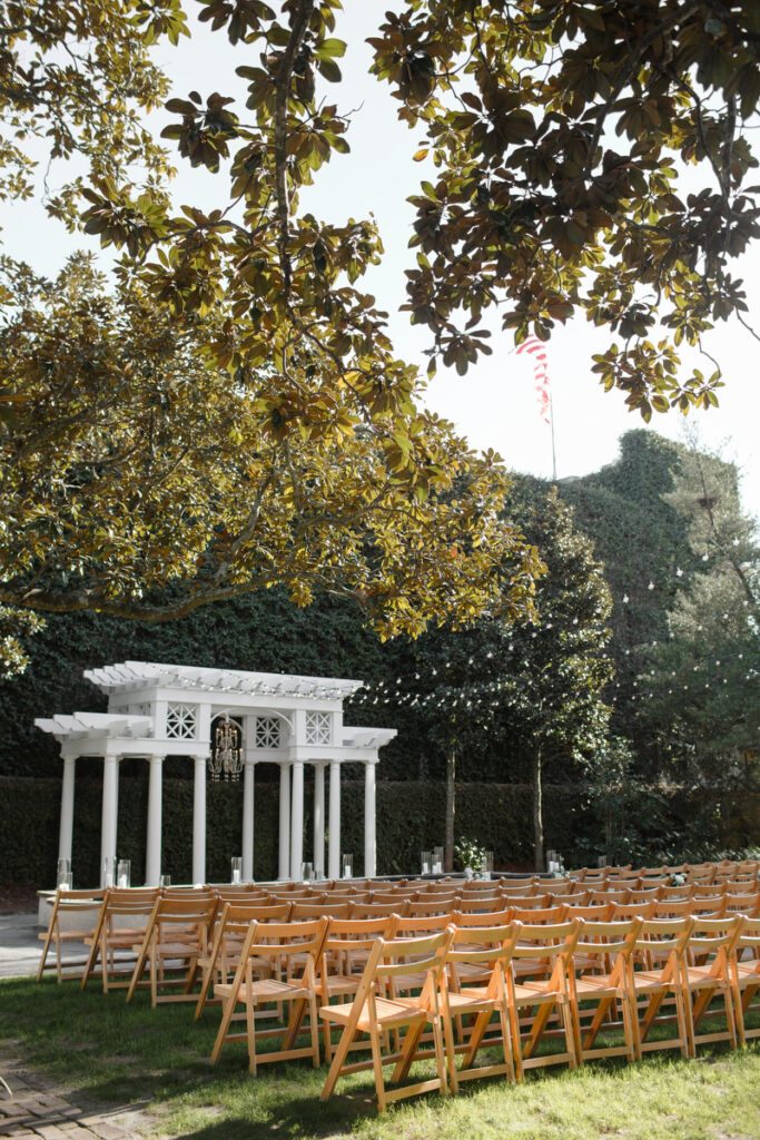 William Aiken House Wedding ceremony chairs and pergola