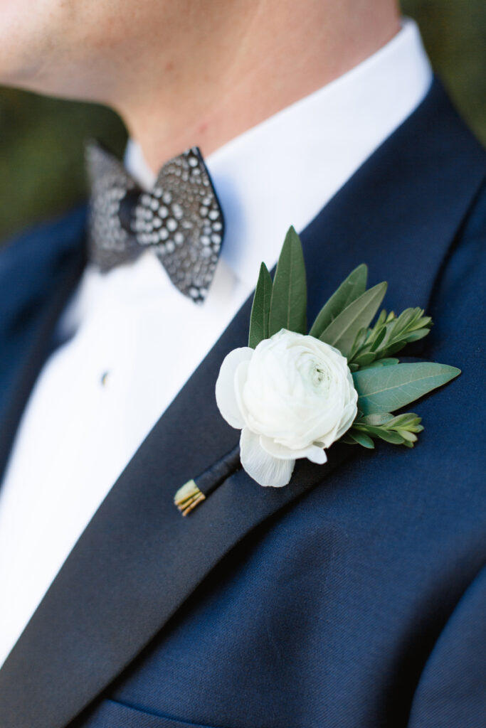 William Aiken House Wedding groom white rose boutonniere