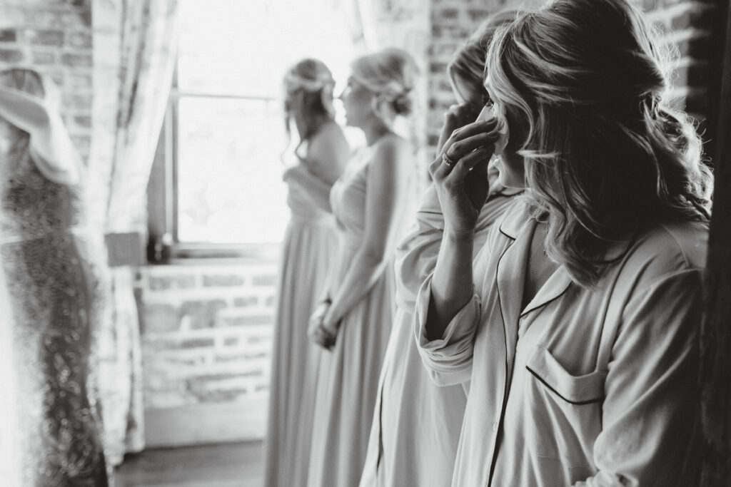 William Aiken House Wedding bridesmaid tearing up at bride getting ready