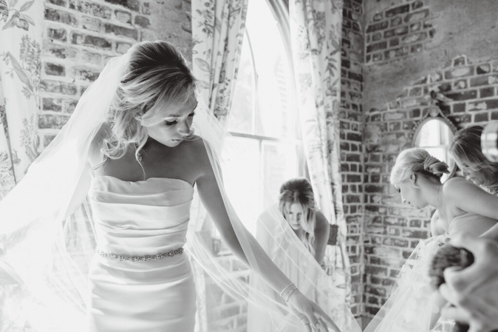 William Aiken House Wedding bridesmaids helping bride get ready