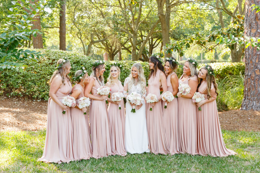 Westin Hilton Head wedding bridal party portrait. Bridesmaids in soft pink gowns and flower crowns