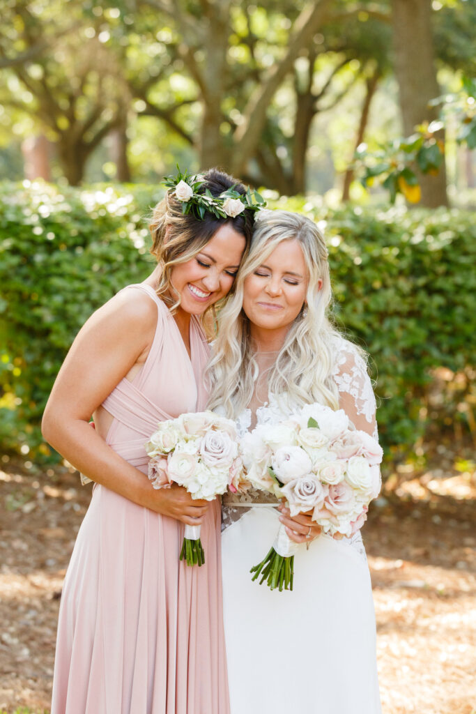 Westin Hilton Head wedding bride hugging bridesmaid