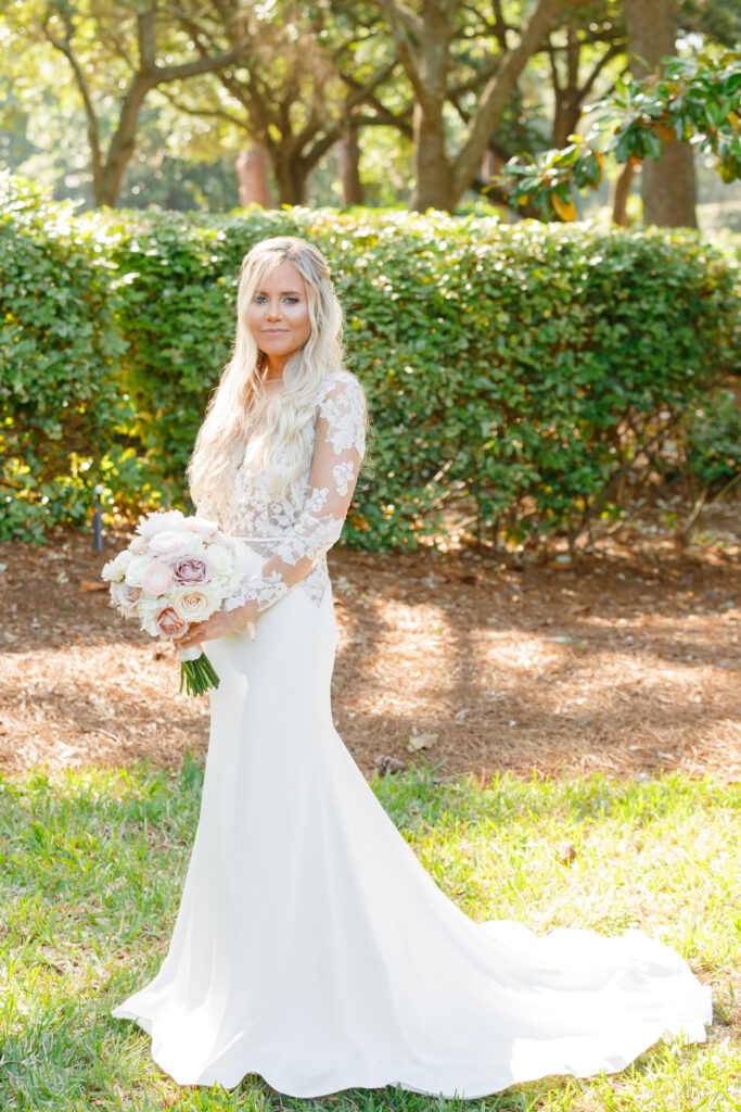 Westin Hilton Head wedding bride holding bouquet in lace accented dress