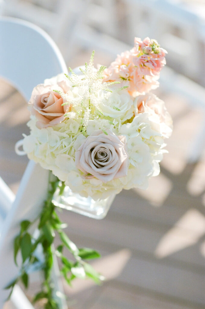 Westin Hilton Head wedding ceremony chair decor of white, pink and mauve roses