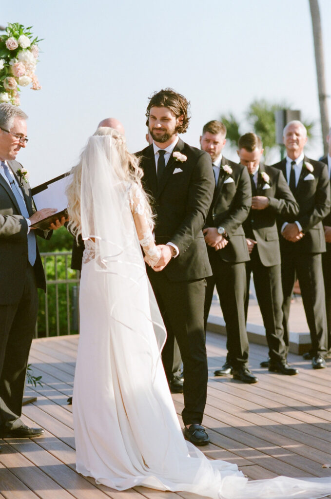 Westin Hilton Head wedding groom smiling at bride during ceremony