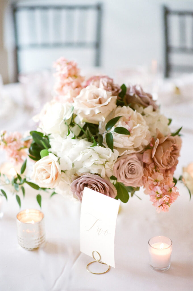 Westin Hilton Head wedding floral centerpiece with pink, white, and mauve roses.