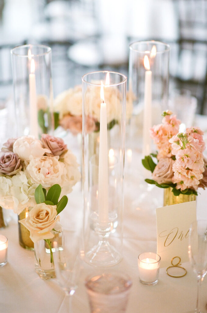 Westin Hilton Head wedding tall candle holders with pink and white rose-filled vases