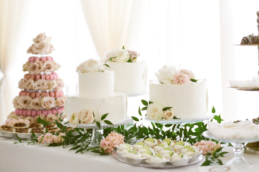 Westin Hilton Head wedding dessert table with cakes, macaroon tower, and miniature key lime pies