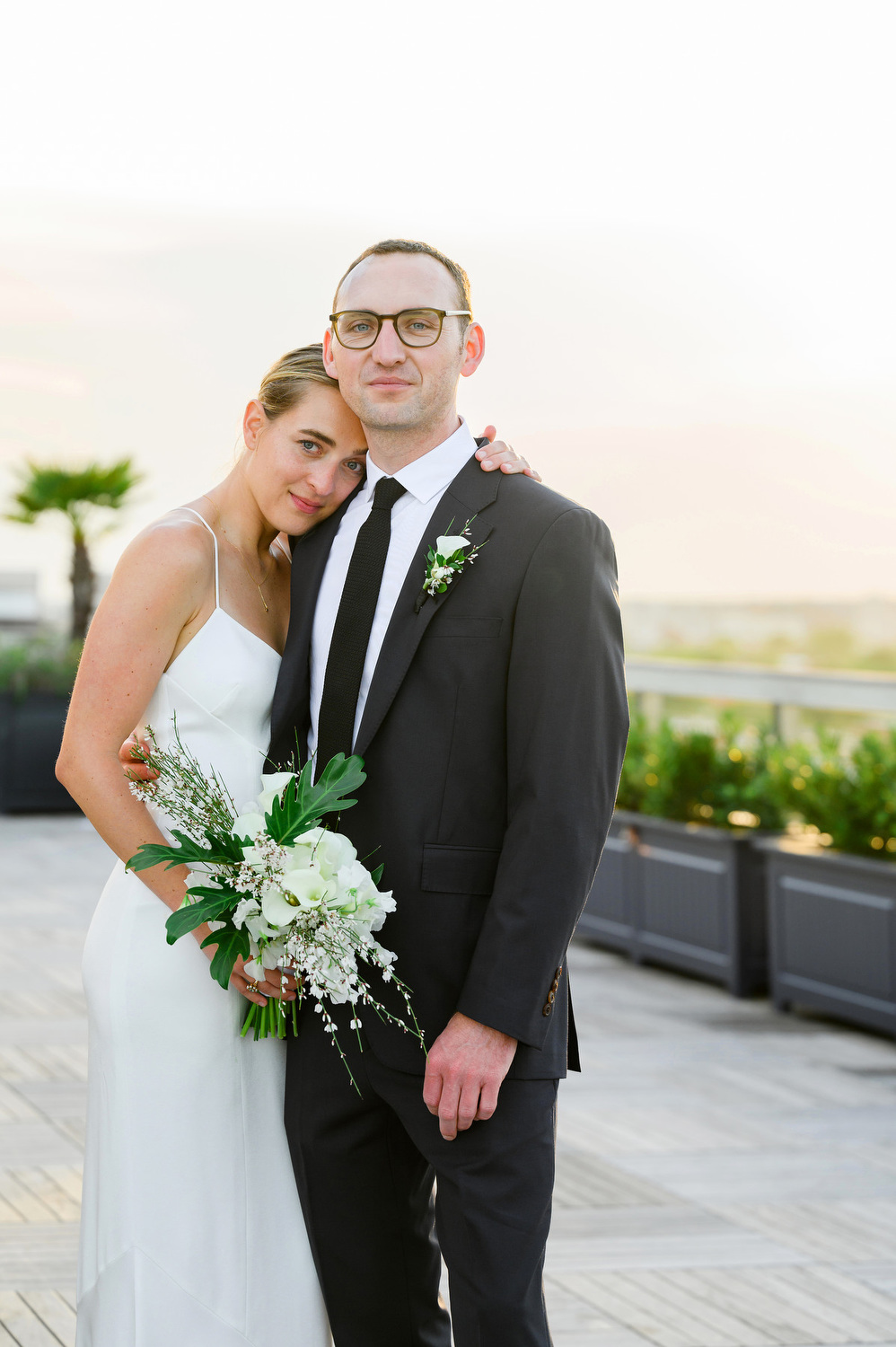 Ashley Matt Dewberry Charleston Wedding-32 Dewberry Charleston wedding bride and groom portrait on the rooftop during sunset