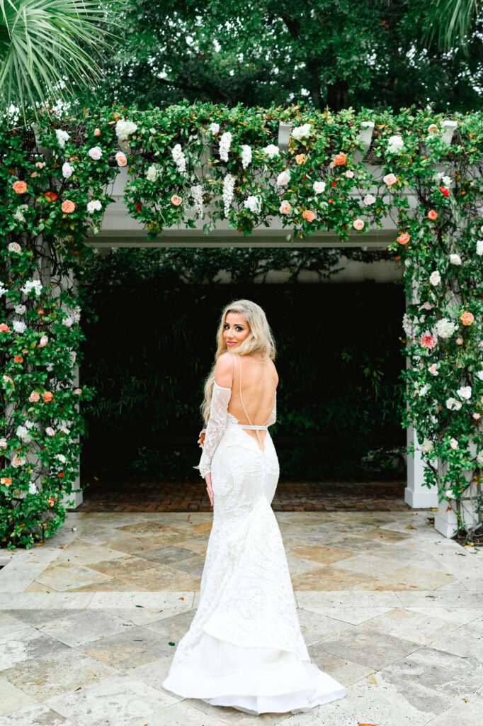 Photo of the back of the bride's dress in the courtyard at a Cannon Green Wedding