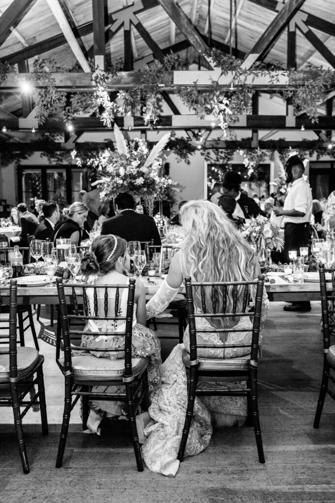 Bride with flower girl during the reception in the Trolley Room at a Cannon Green Wedding