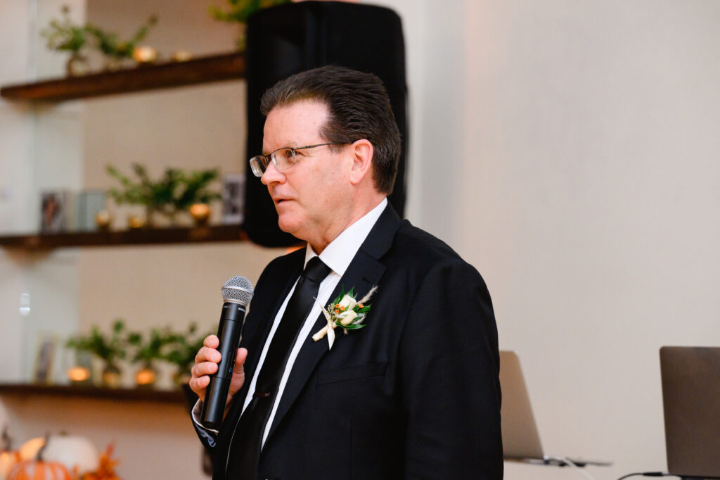 Step father of the bride giving a toast during the reception in the Trolley Room at a Cannon Green Wedding