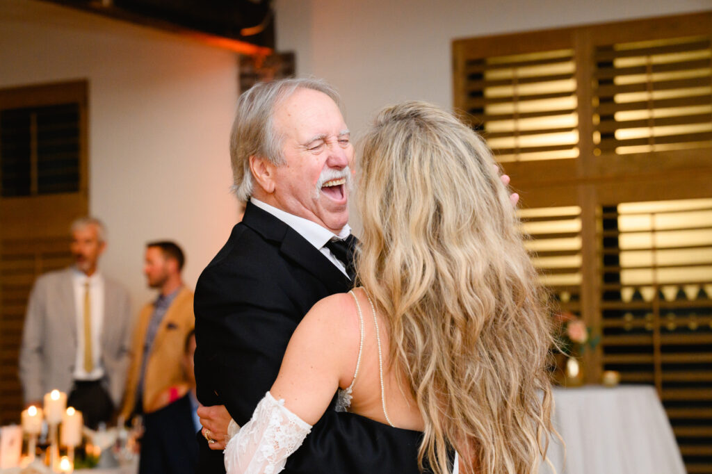 Bride dances with father during the reception in the Trolley Room at a Cannon Green Wedding