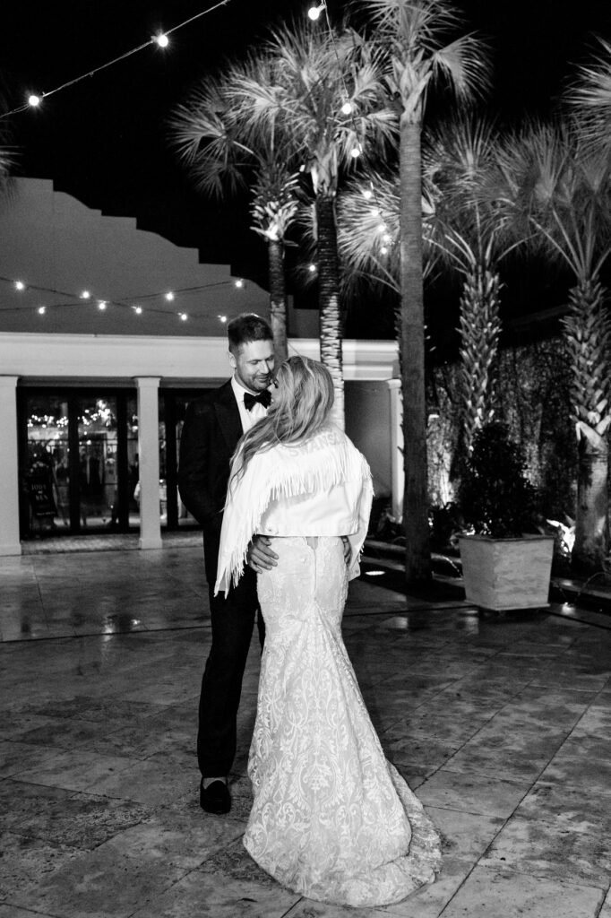 Bride and groom in the courtyard at night at a Cannon Green Wedding