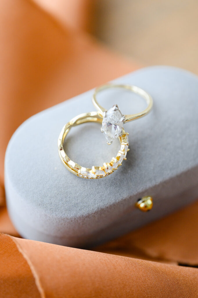 Engagement and wedding ring with gold bands and diamons