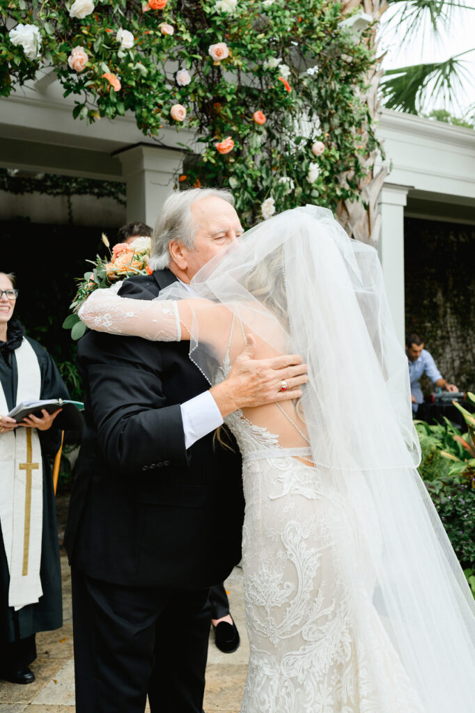 Father of the bride hugs his daughter at a Cannon Green Wedding