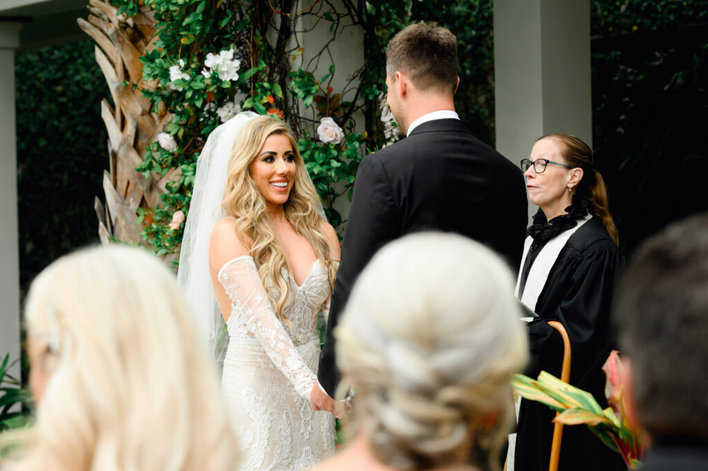 Bride smiling during ceremony at a Cannon Green Wedding