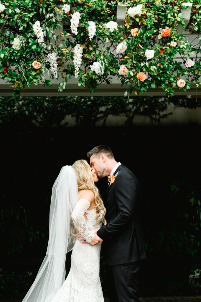 Couple kiss at the end of a ceremony at a Cannon Green Wedding