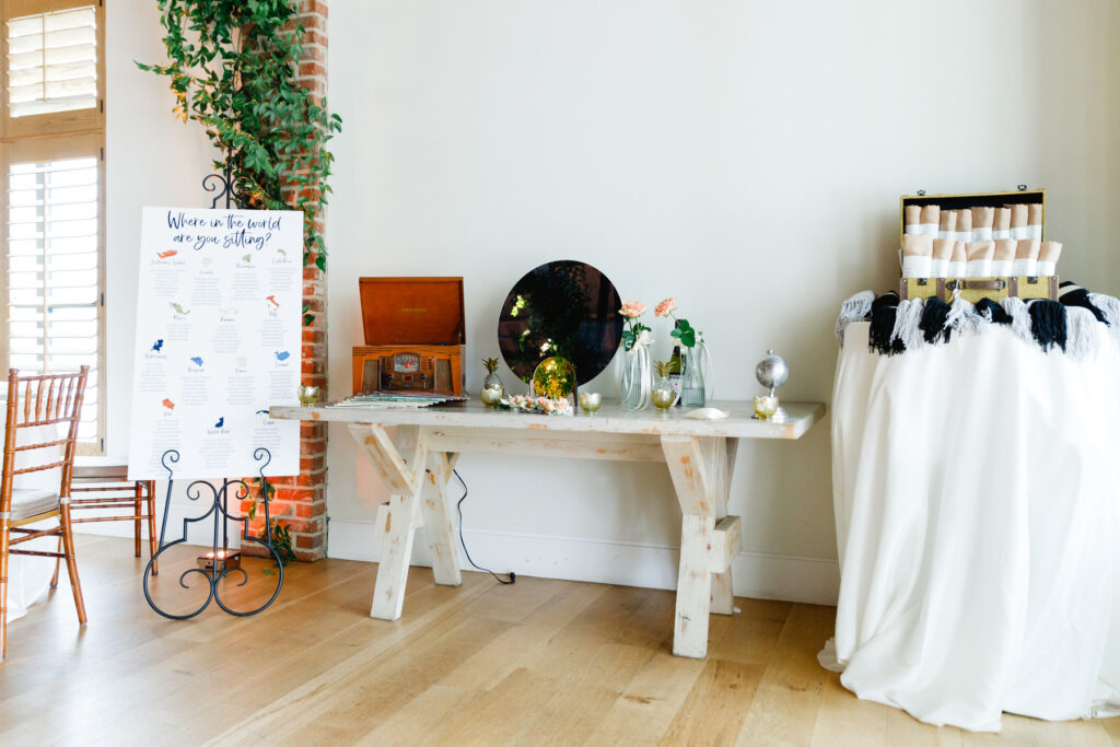 Receiving table with record player and blankets at Cannon Green Wedding