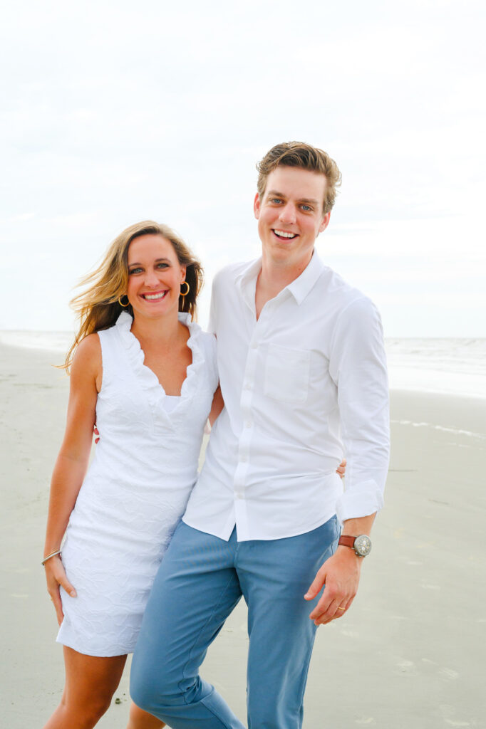 Couple laughing during a Kiawah beach family photo