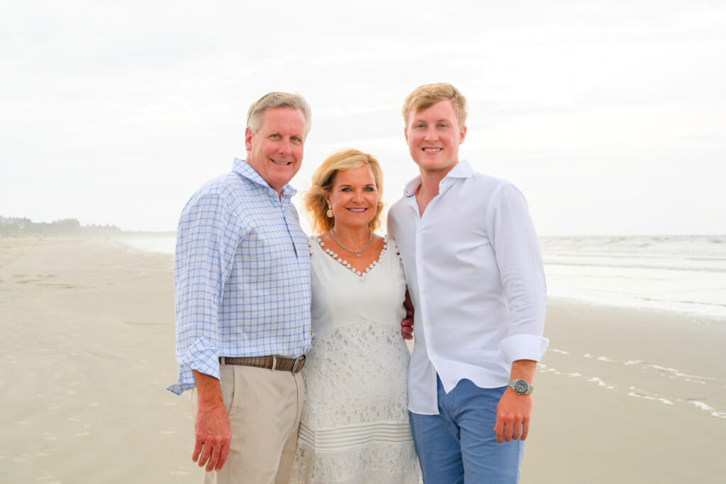 Parents with their son during a Kiawah beach family photo