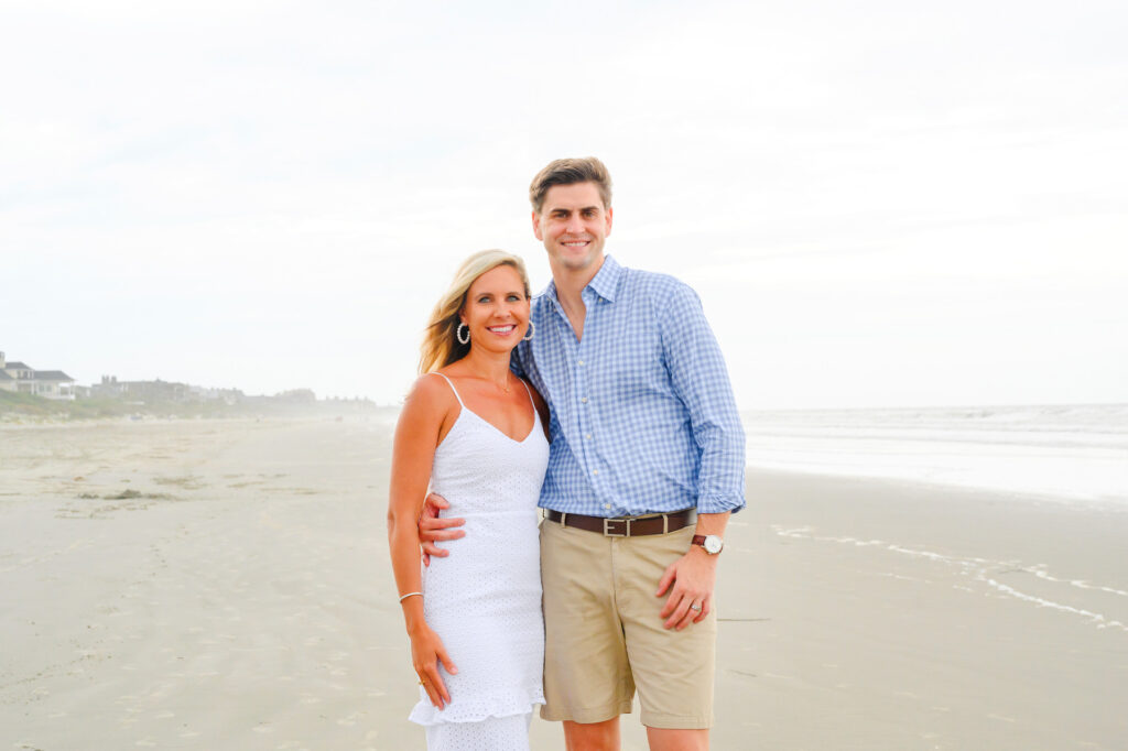 Married couple posing together during a Kiawah beach family photo