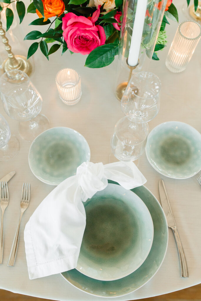 Cedar Room wedding reception with green plate place setting