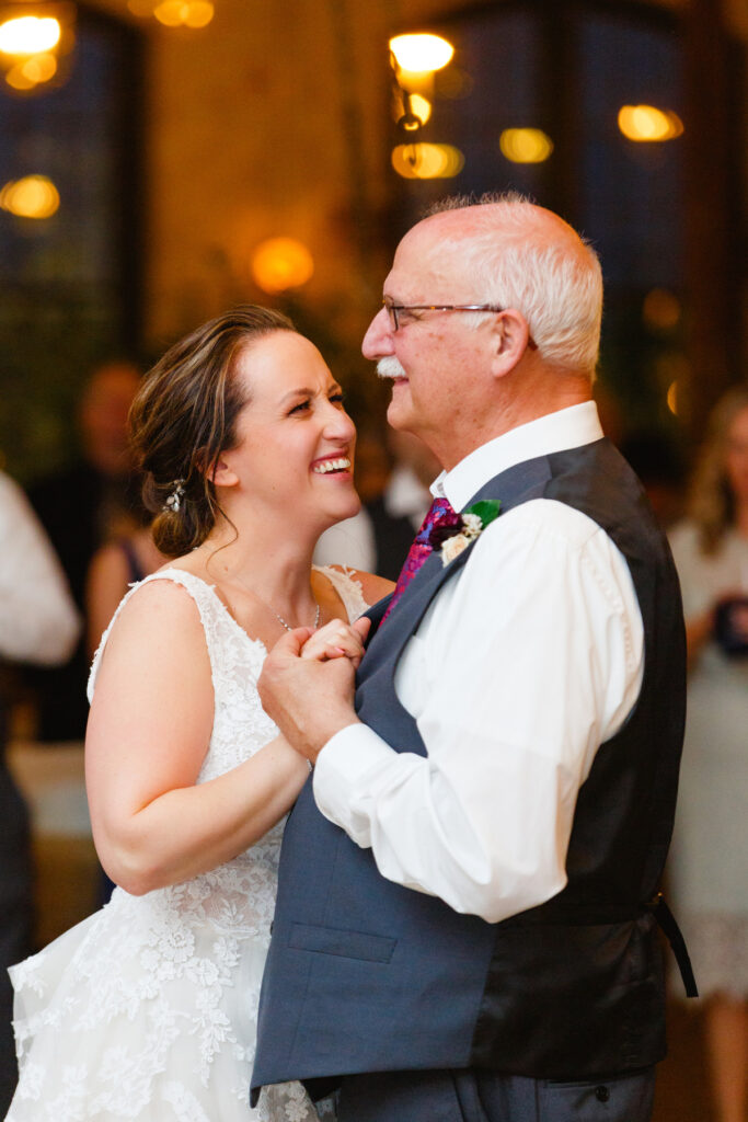 Cedar Room wedding reception with the bride dancing with her father