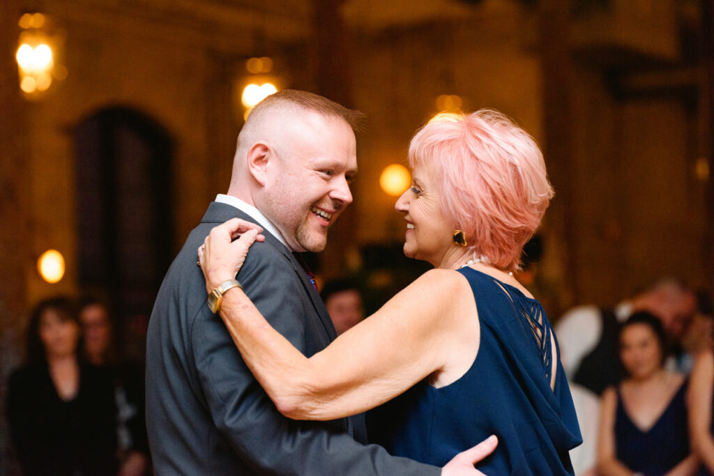 Cedar Room wedding reception with the groom dancing with his mother