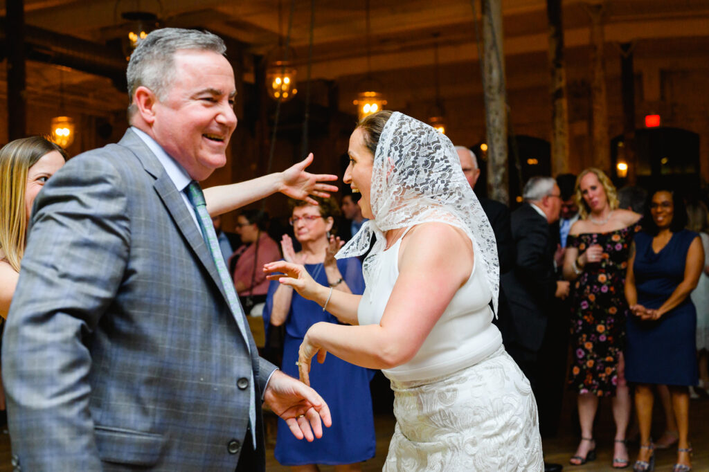 Cedar Room wedding with the bride dancing at reception for a traditional polish bride dance