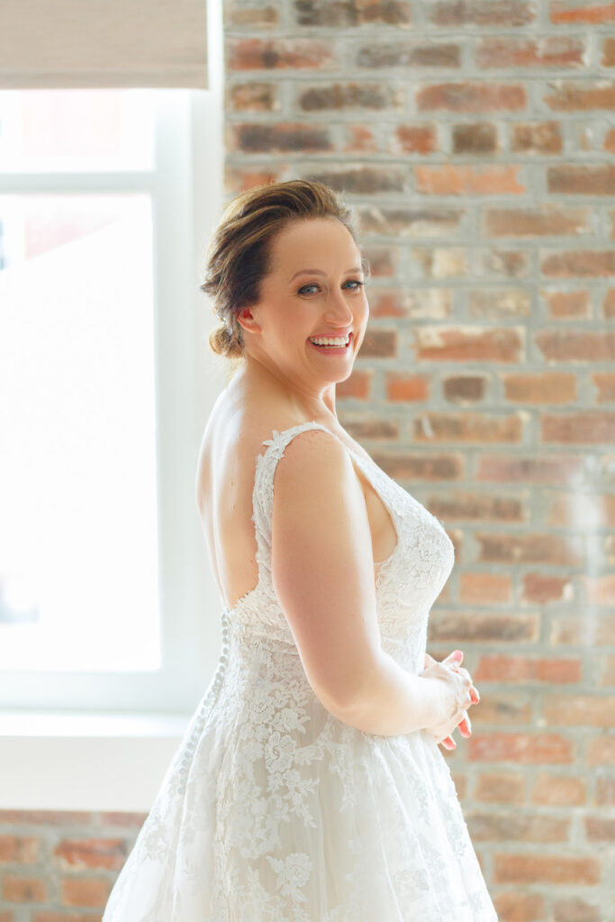 Cedar Room wedding photo of the bride while getting ready at Planter's Inn