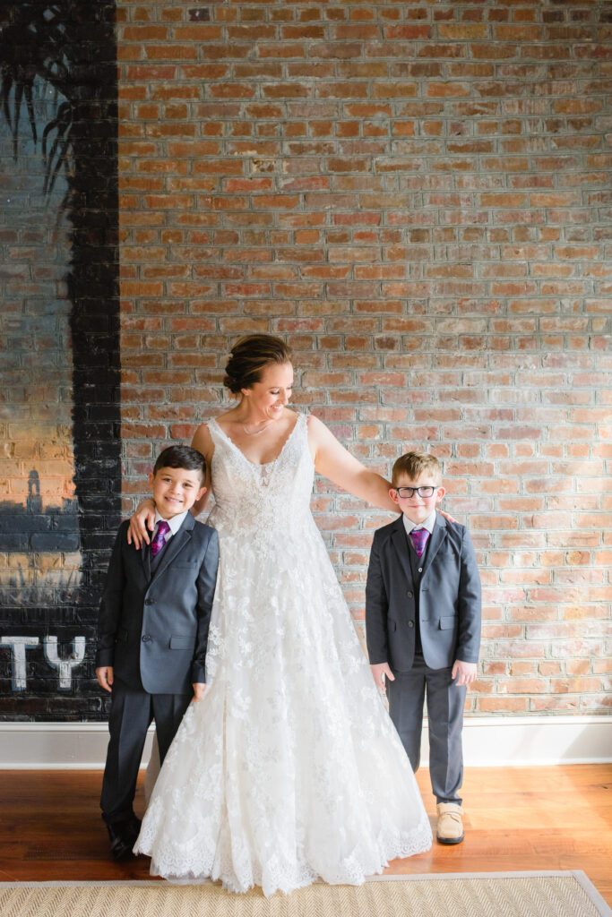 Cedar Room wedding photo of the bride with the ring bearers at Planter's Inn