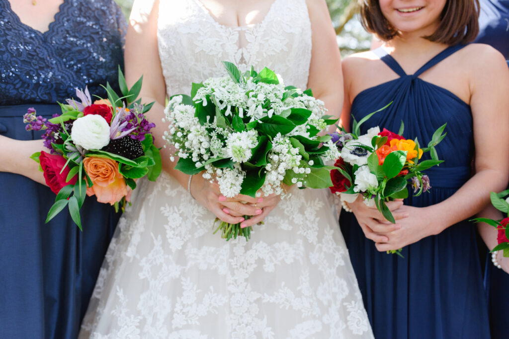 Cedar Room wedding portrait of the bridal and bridesmaids' bouquets at White Point Gardens