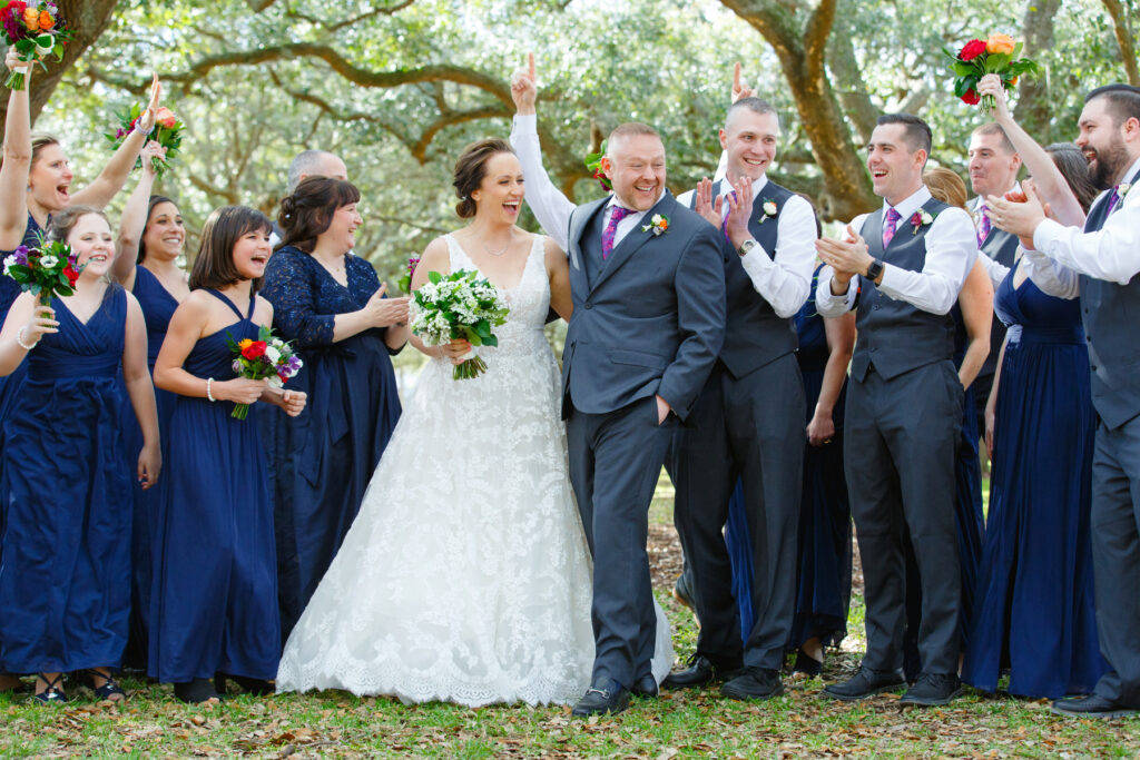 Cedar Room wedding candid of wedding party having fun while at White Point Gardens