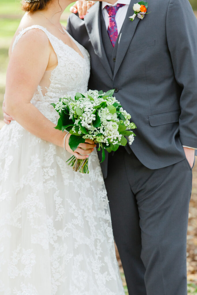 Cedar Room wedding pic of bride's all white flower bouquet