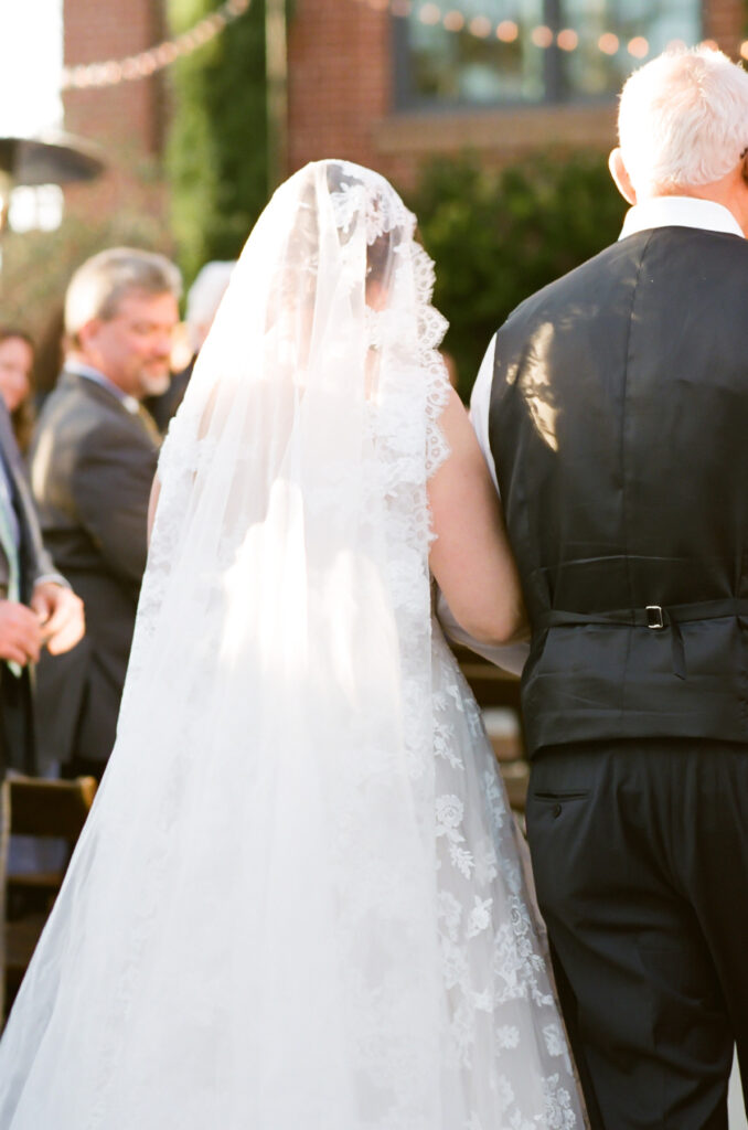 Cedar Room wedding of the bride's veil during the processional