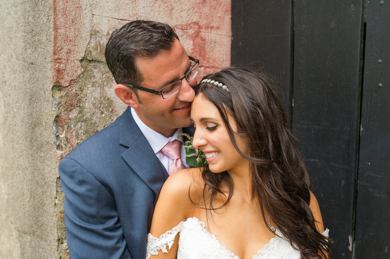 Legare Waring House wedding portrait of groom in blue suit and bride in white dress