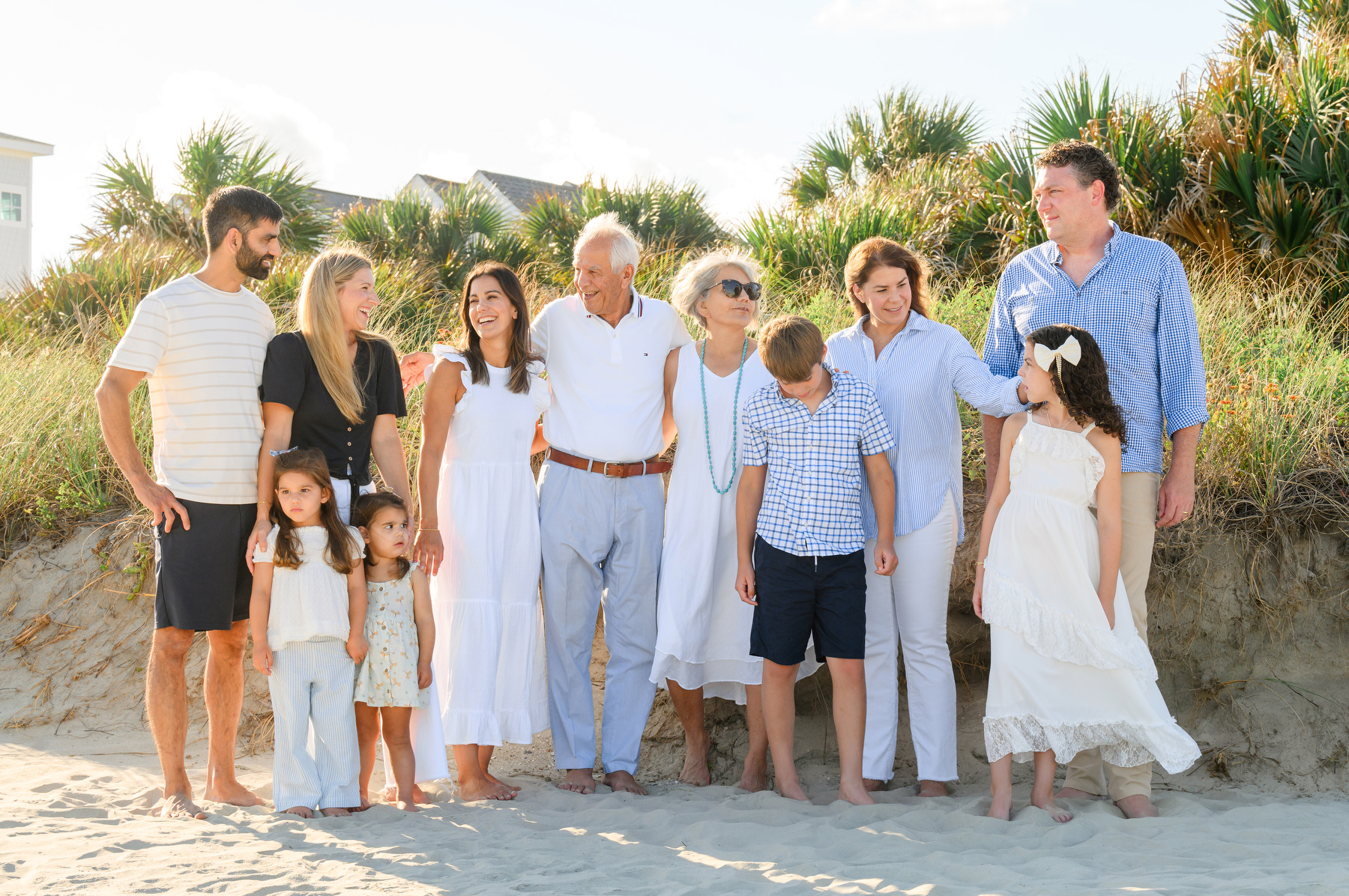 Folly Beach family photos portrait of a multi generational family on the beach with beach grass in the background